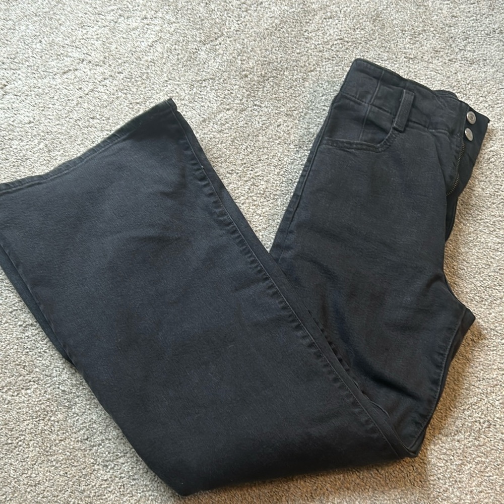 Washed black ribcage bell jeans